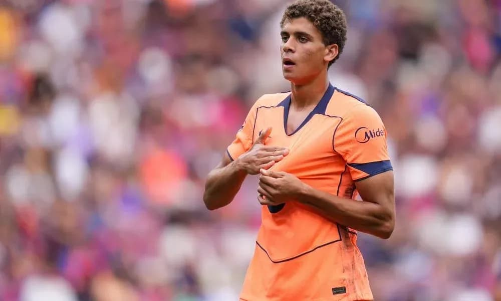 Player adjusting shirt during match at stadium