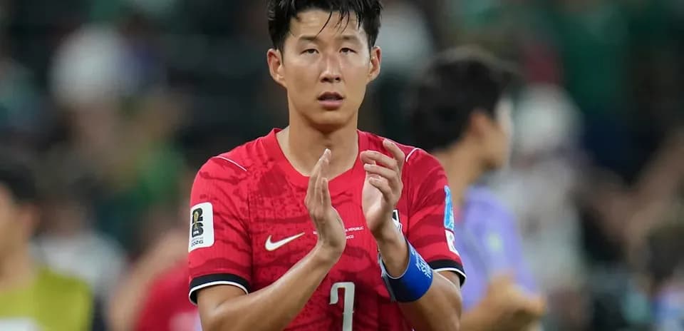 Player applauding fans after the match
