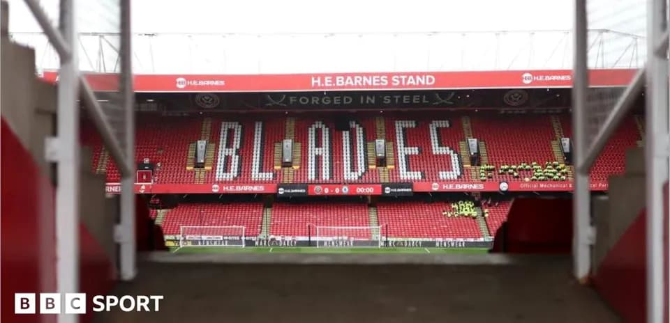 View of H.E. Barnes Stand with 'BLADES' sign