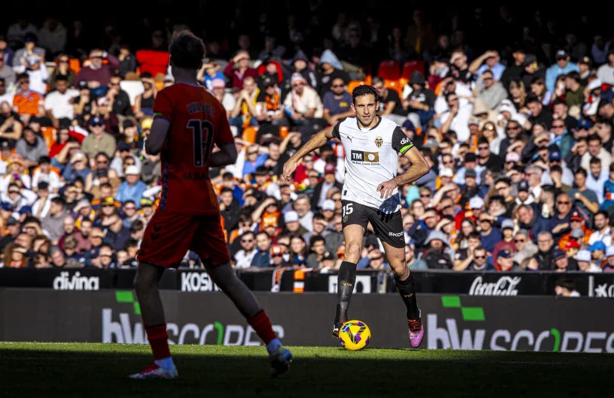 Valencia player dribbling during La Liga match