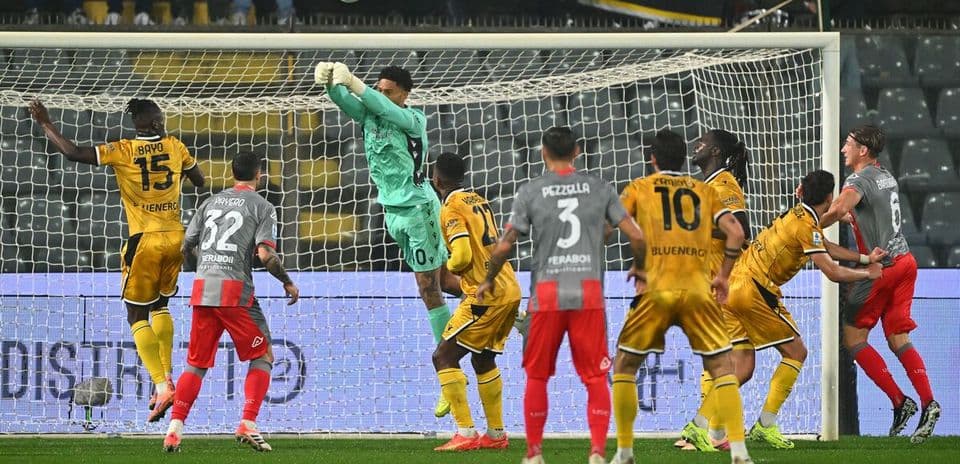 Goalkeeper catching ball during Udinese match
