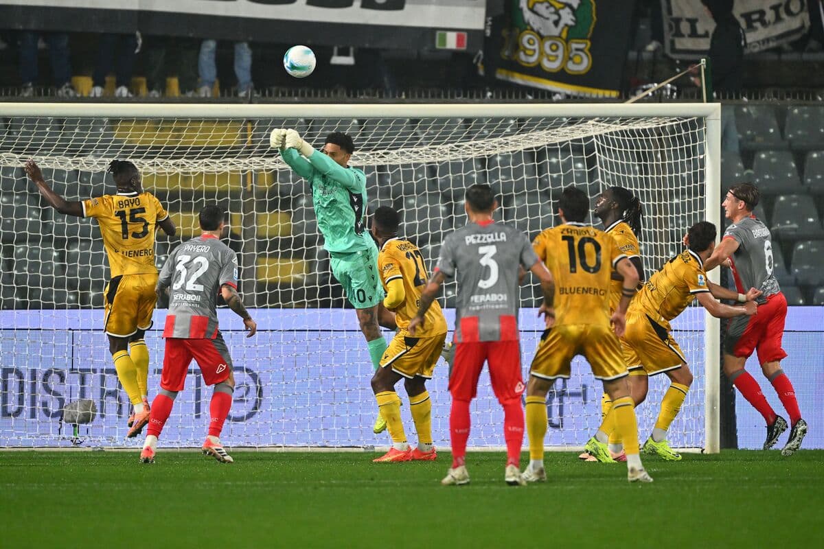 Goalkeeper catching ball during Udinese match