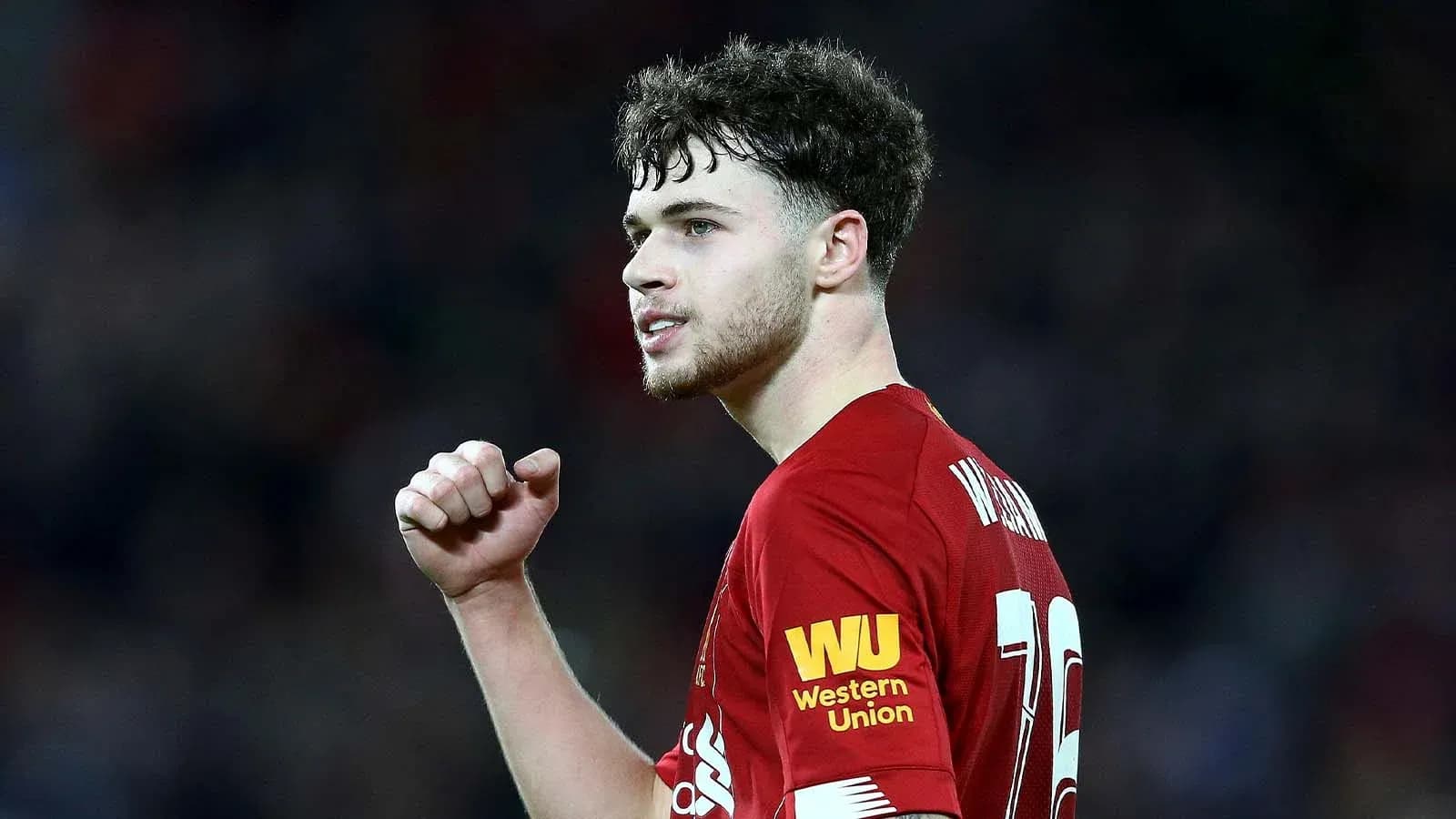 Player celebrating during a match for Liverpool