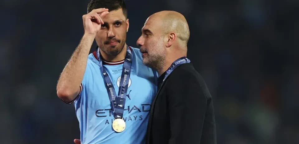 Player and coach celebrating after winning championship