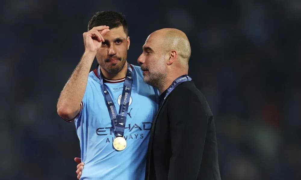 Player and coach celebrating after winning championship