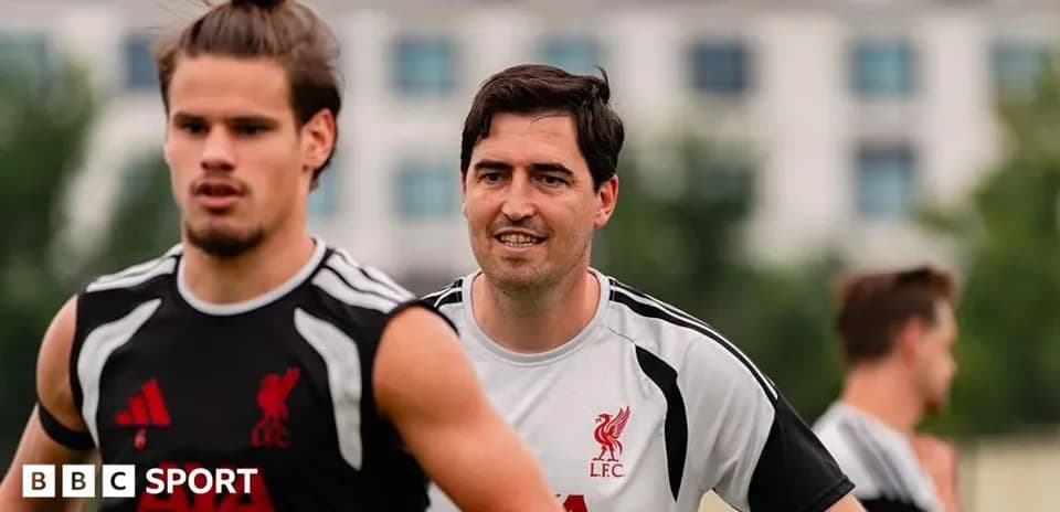 Liverpool players training on the pitch