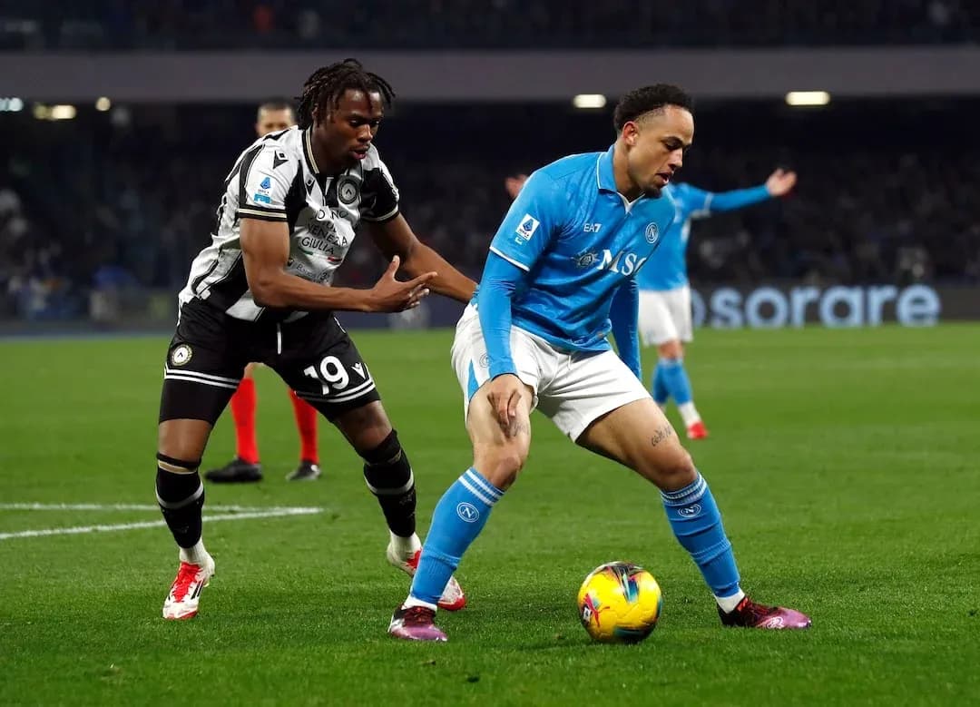 Napoli player challenged by Udinese opponent