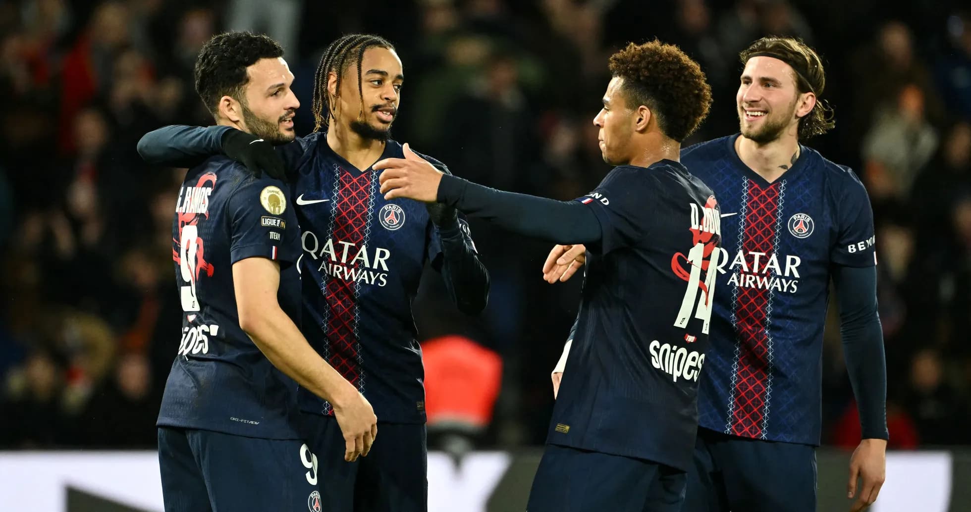 PSG players celebrating after scoring a goal