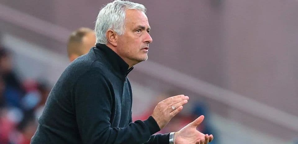 Manager gesturing during a football match