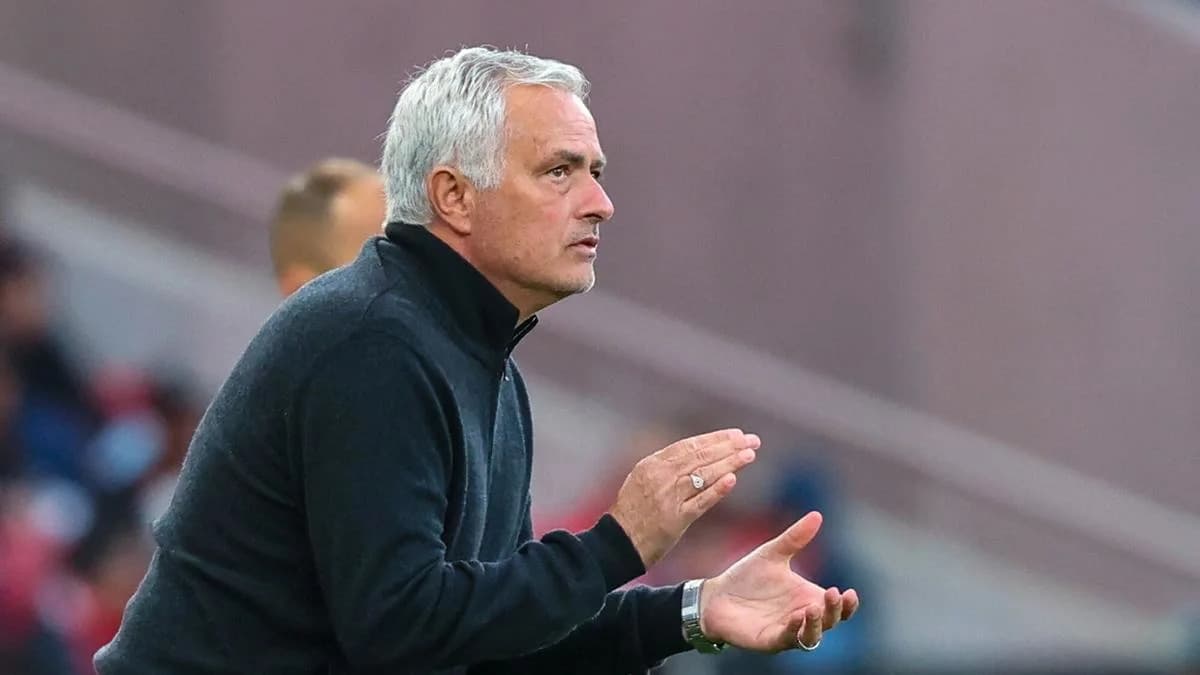 Manager gesturing during a football match