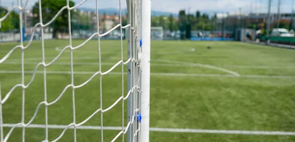 Close-up of soccer goal on training field