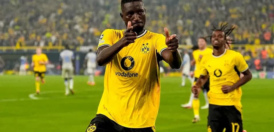 Player celebrating after scoring a goal for Borussia Dortmund