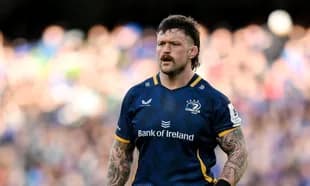 Rugby player in Leinster jersey on the field