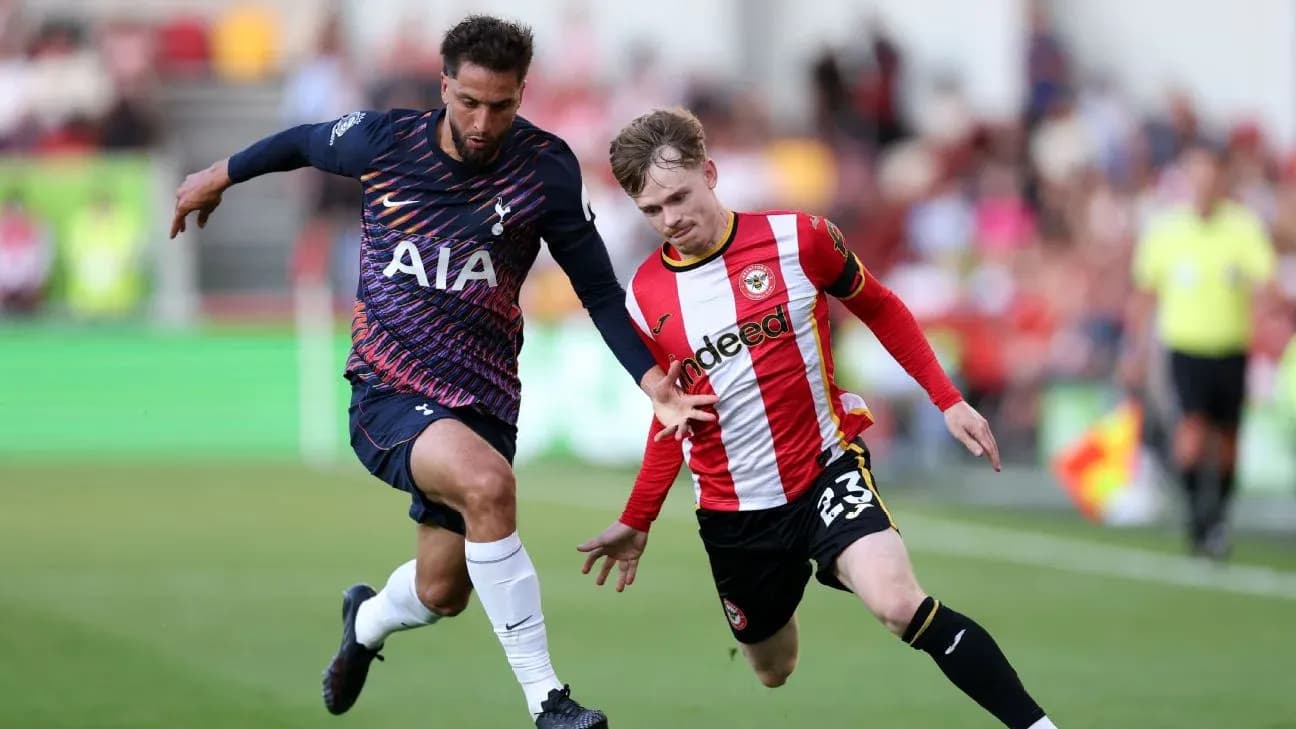 Brentford and Tottenham players competing for the ball