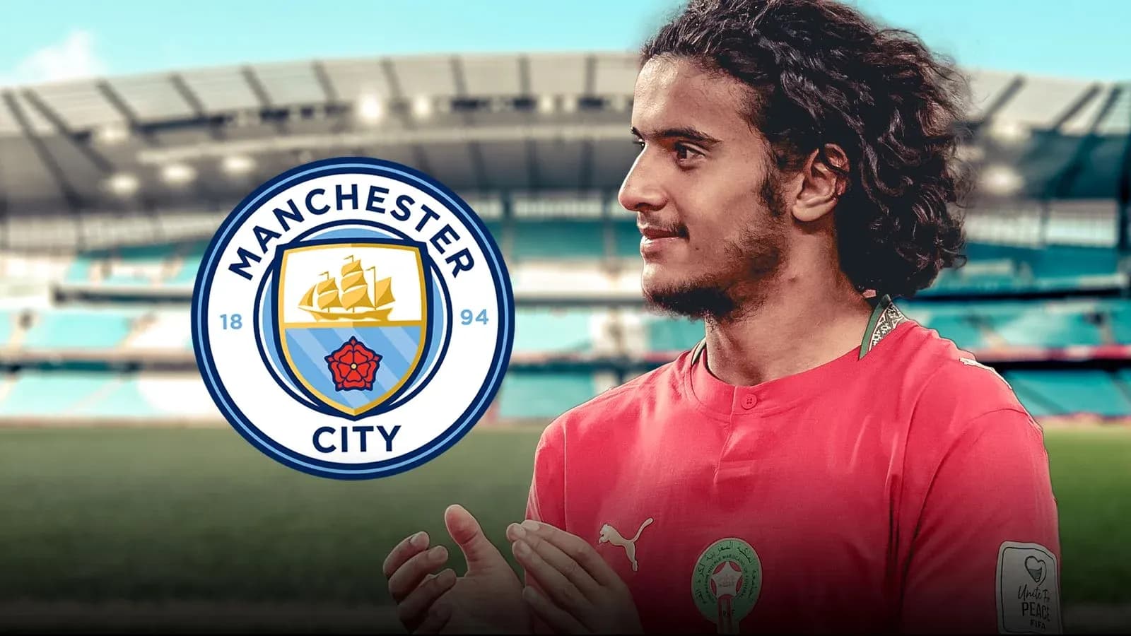 Player in Manchester City jersey at stadium