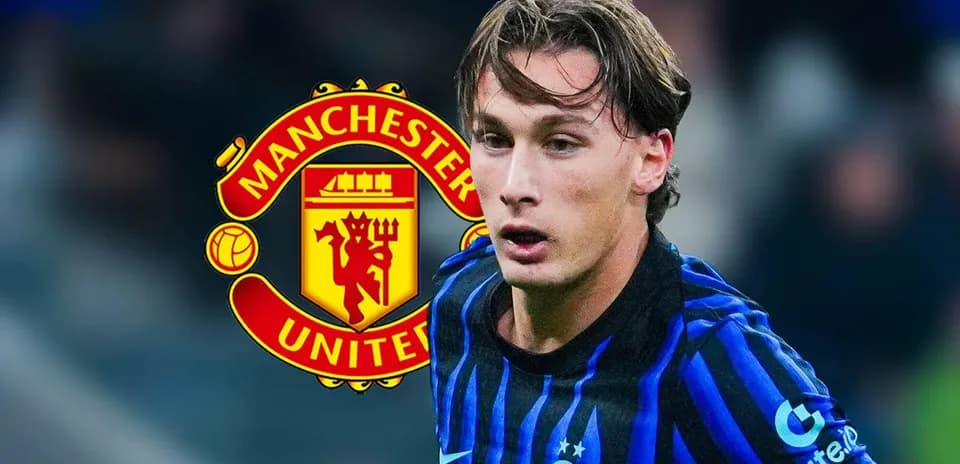 Player in blue and black kit with Manchester United logo