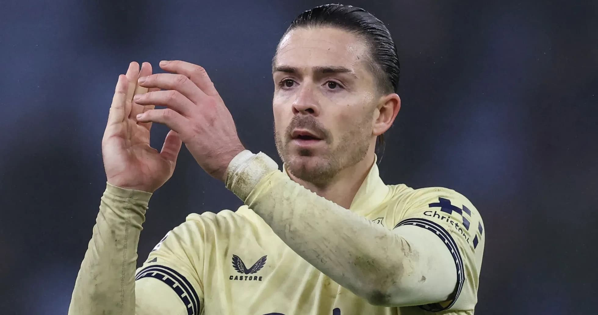 Player applauding fans after a match