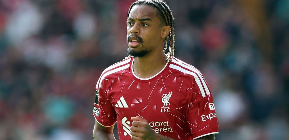 Player in Liverpool FC kit during match action