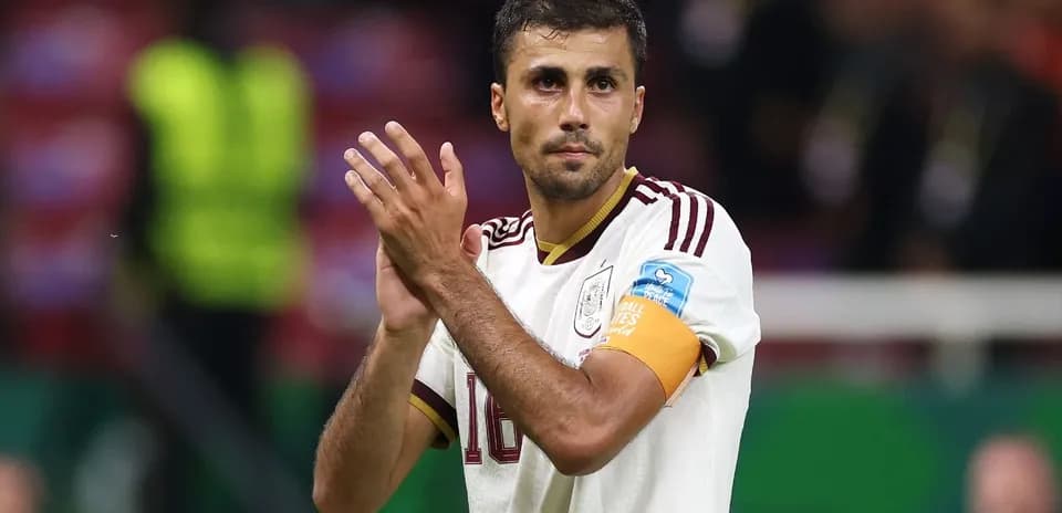 Player applauding fans after the match