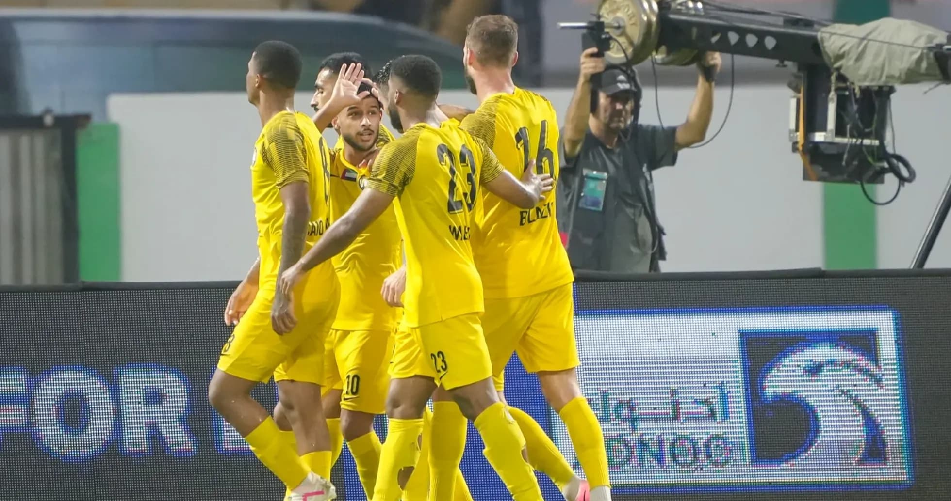 Players celebrating a goal during Bani Yas U23 match