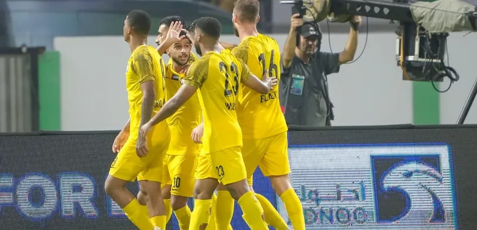Players celebrating a goal during Bani Yas U23 match