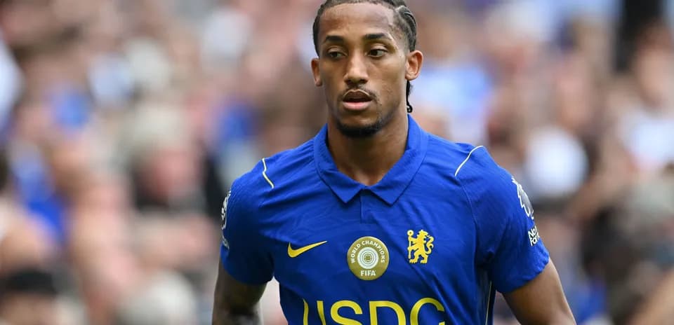 Player in blue Chelsea kit during match