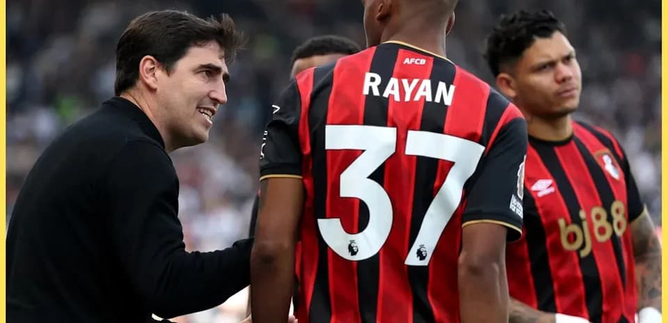 Coach discussing strategy with AFC Bournemouth players