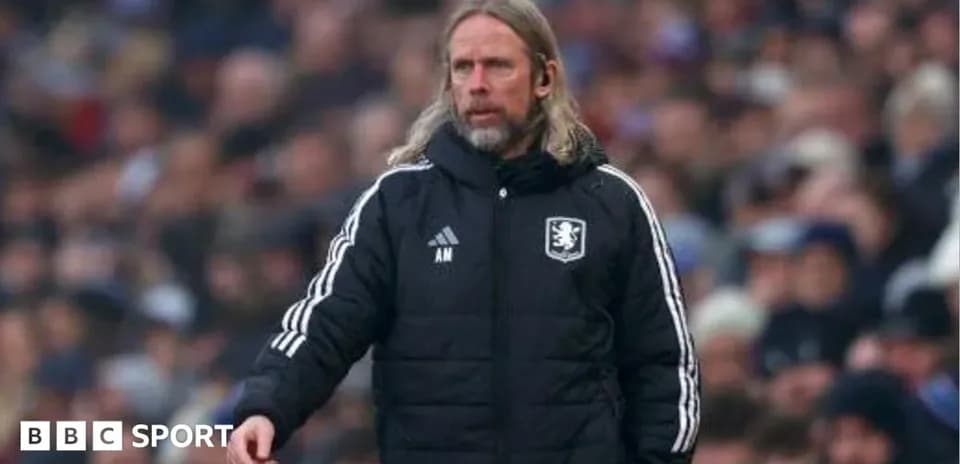 Manager directing team from sidelines during match