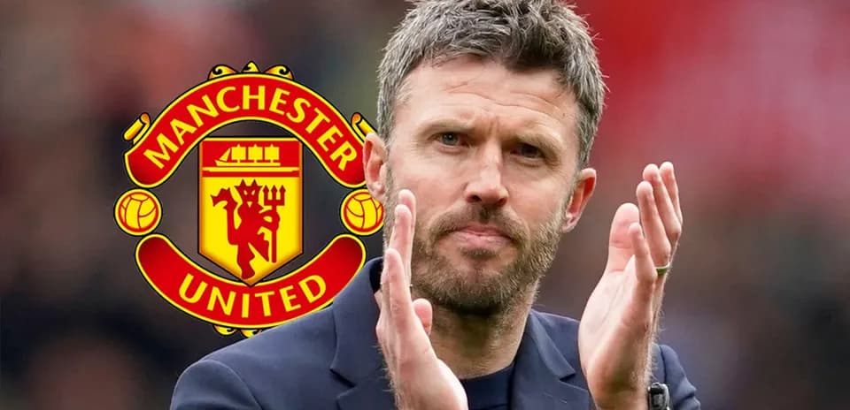 Manchester United manager applauding fans in stadium