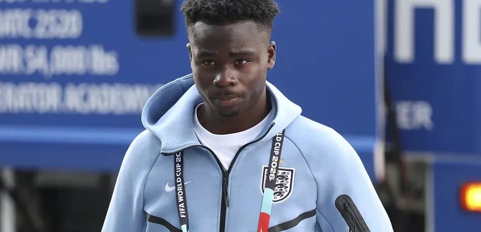 Player arriving at venue in training attire