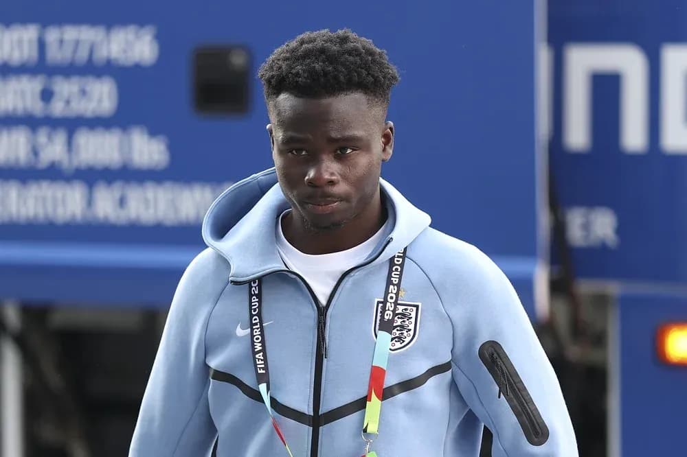 Player arriving at venue in training attire