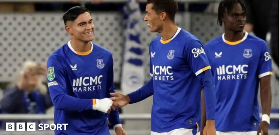 Everton players celebrating on the pitch