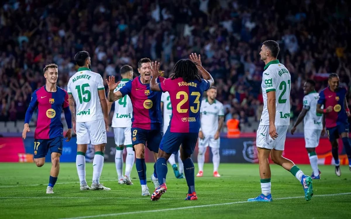 Barcelona players celebrating a goal during match