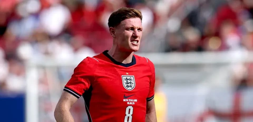 Player in red England kit during match