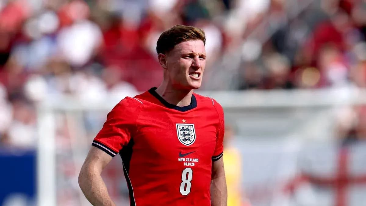 Player in red England kit during match