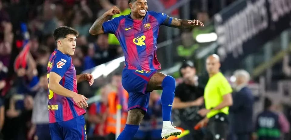 Barcelona players celebrating a goal during match