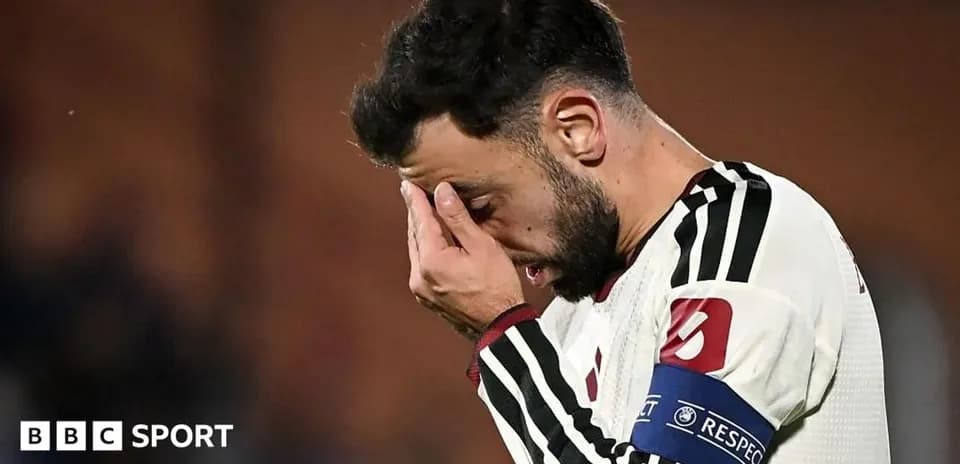 Player holding his head in disappointment on the field