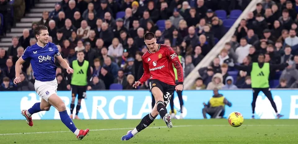 Everton and Manchester United players in action