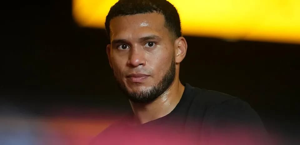 Athlete with a focused expression in training environment