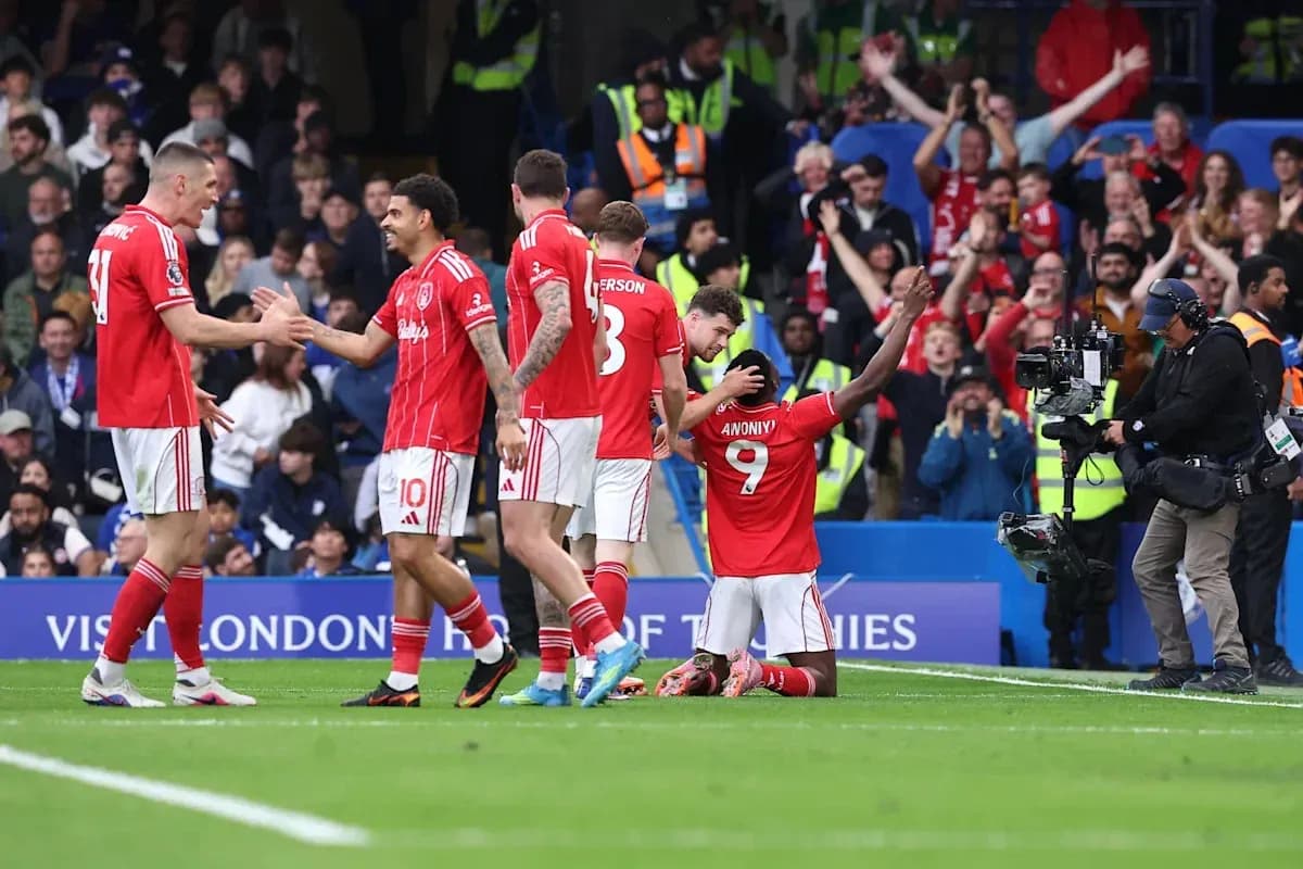 Players celebrating after a goal during match