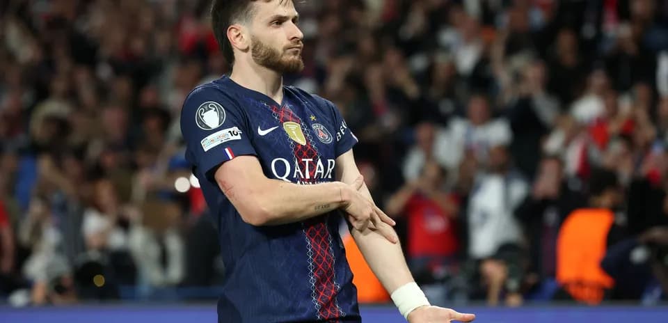 Player celebrating during a match for PSG