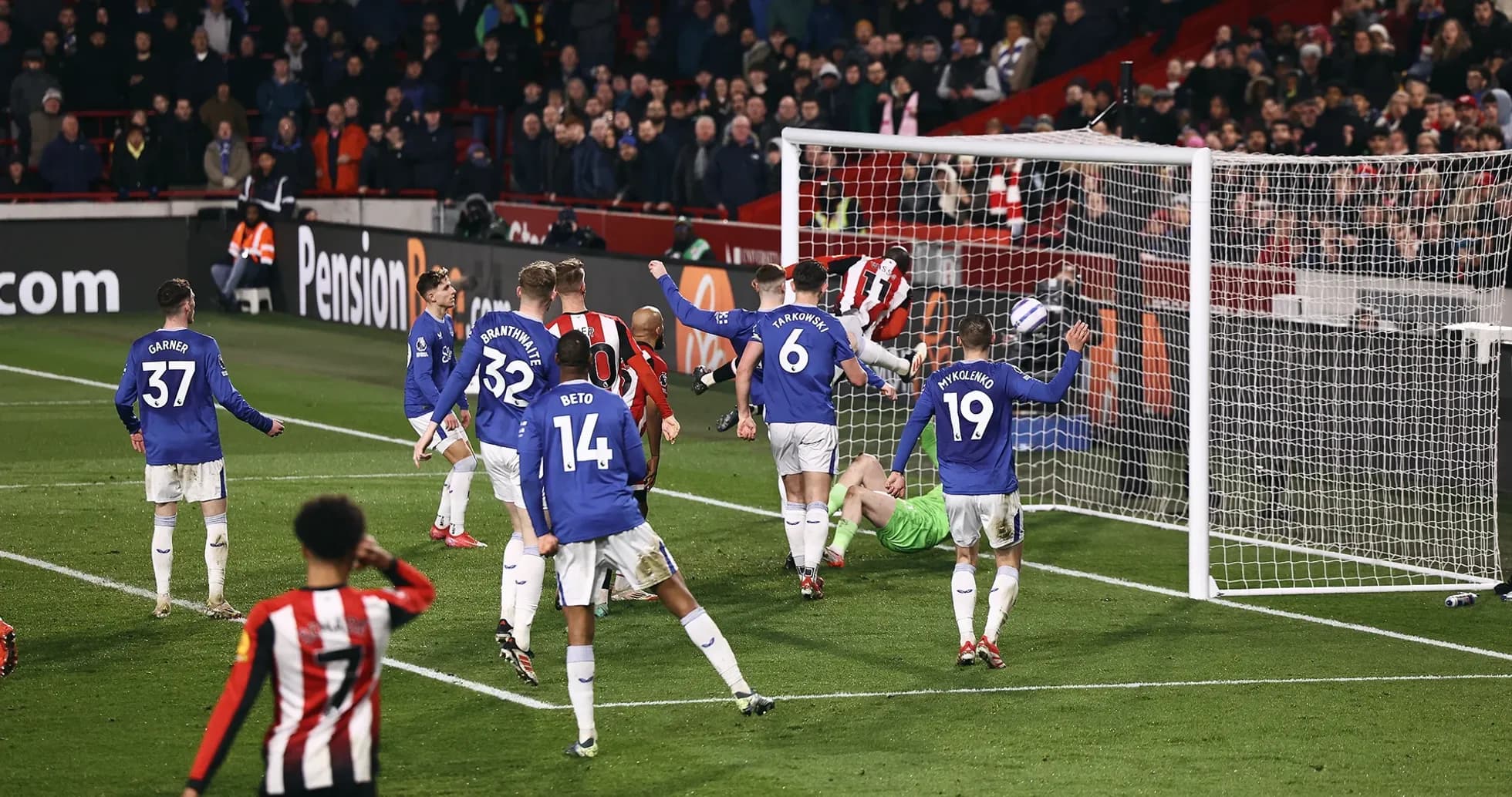Brentford players celebrating a goal against Everton