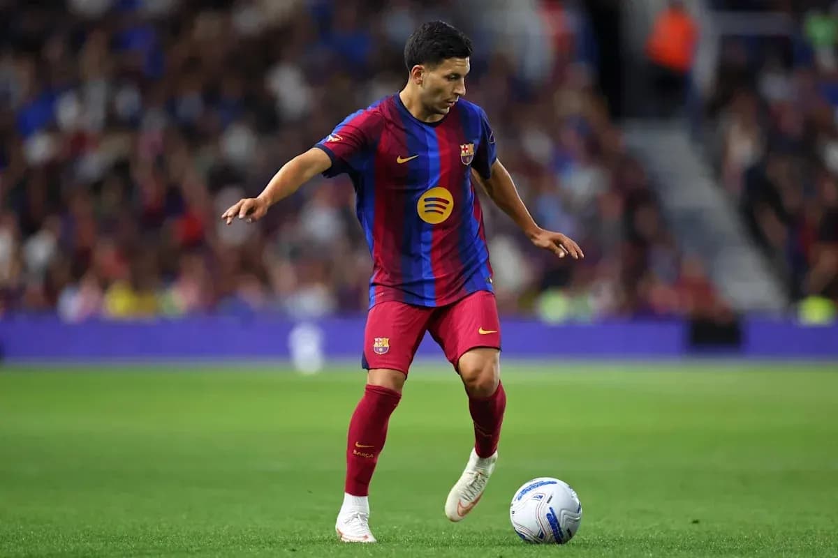 Player dribbling ball during match for FC Barcelona