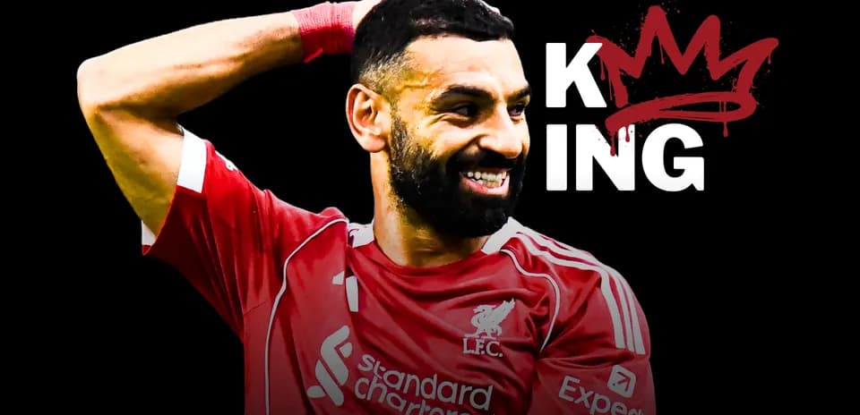 Player celebrating in Liverpool jersey with text 'KING'