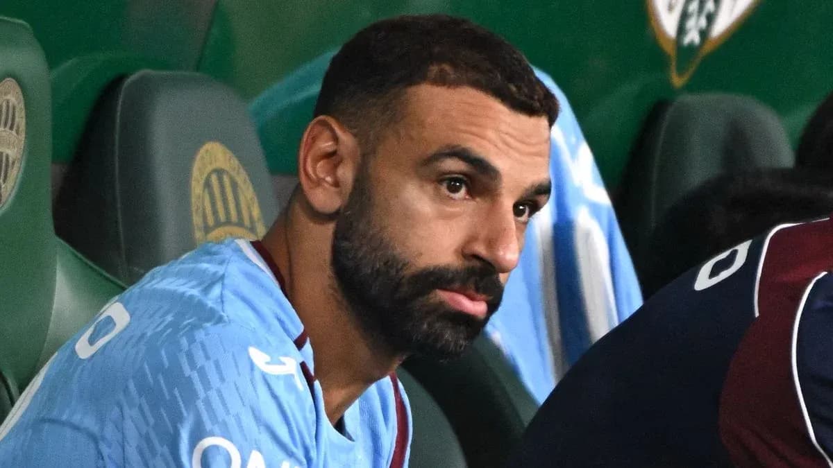 Player sitting on the bench during a match