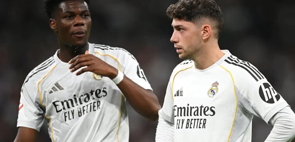 Two Real Madrid players discussing during a match