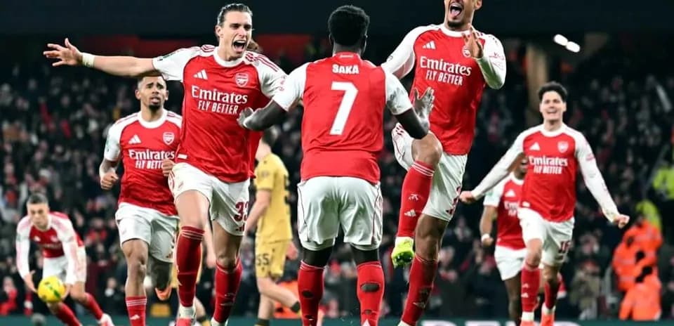 Arsenal players celebrating a goal during match
