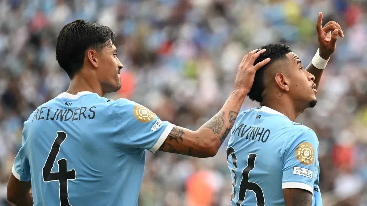 Two players celebrating a goal during match