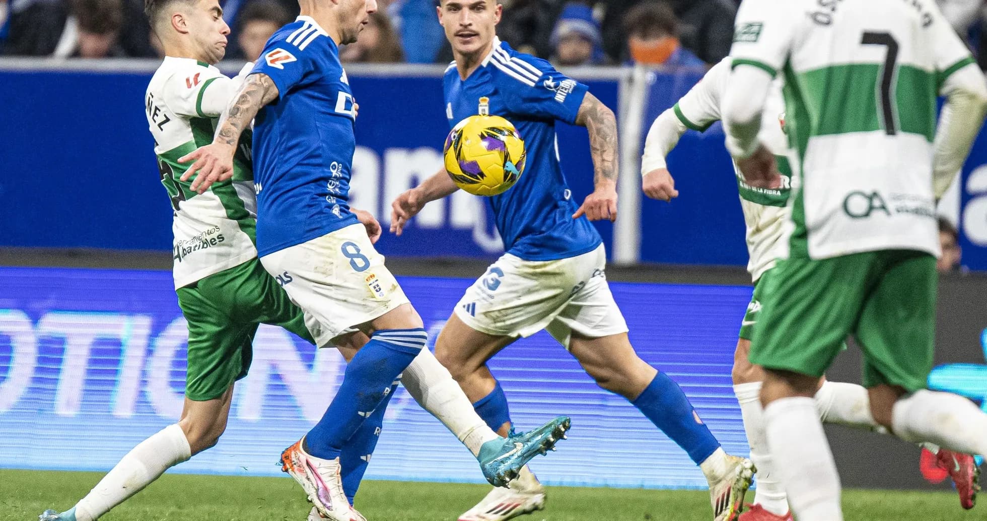 Oviedo players in action against Elche