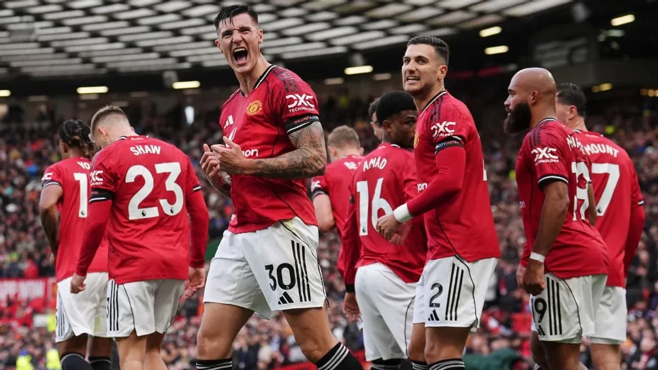 Manchester United players celebrating a goal